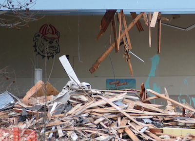 The old style bulldog mascot of Faubion School guards the demolition site. Photo by Carl Jameson