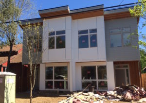 This new duplex under construction is the one discussed in this article; the author lives directly north of the new building. The project is located on NE 32nd Avenue between Emerson and Sumner streets. Photo by Susan Trabucco