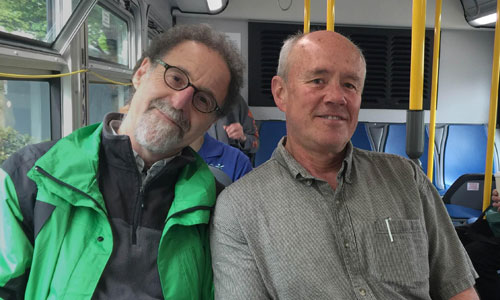 Geoffrey Hiller (left) and Tom Vandel rode TriMet Line 75 for months to cover – in photos and words – the pulse of society along its route from Milwaukie to St. Johns via 42nd Avenue. The project is on exhibit at Concordia University.