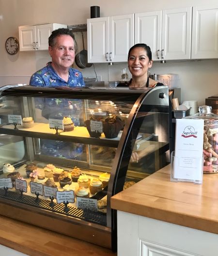 Darrell Hames and Melissa Sanchez stand at the ready to serve snacks, meals and accept catering orders at the new Sugar Street Bakery and Bistro on Alberta Street. Photo by Marsha Sandman